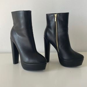 High heel black booties